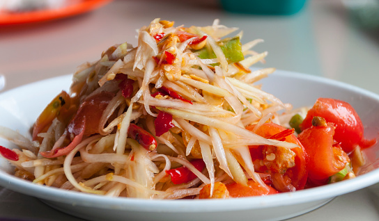 Close up of famous Thai food, papaya salad or what we called 