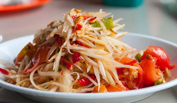 Close up of famous Thai food, papaya salad or what we called "Somtum" in Thai