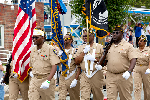Wildwood, New Jersey, USA - June 20, 2015: Honor Guard marching at Veterans of Foreign Wars (VFW) annual parade in Wildwood, New Jersey