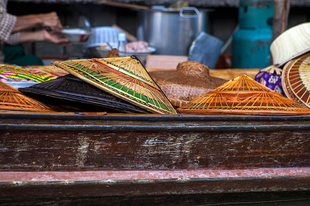 Local peple in Thailand living and trading on the river - Damnoen Saduak floating market near Bangkok