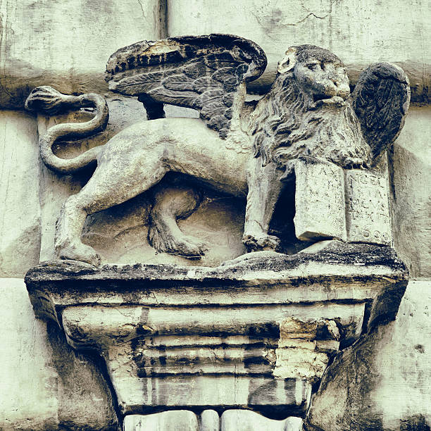 istock fragment of facade decor in Lviv  - Griffon with book 478196953