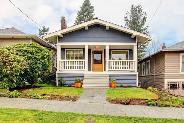 istock Small blue house with white porch exterior. 478197793