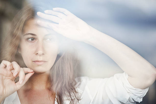 istock Reflection of the girl in the window 478197857