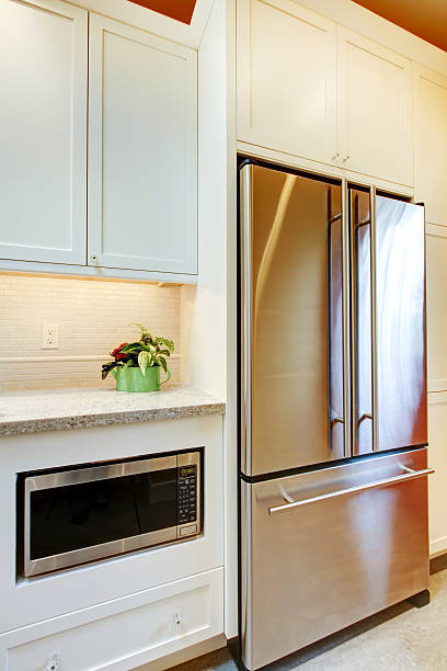 istock Stainless steal refridgirator with microwave. 478197879