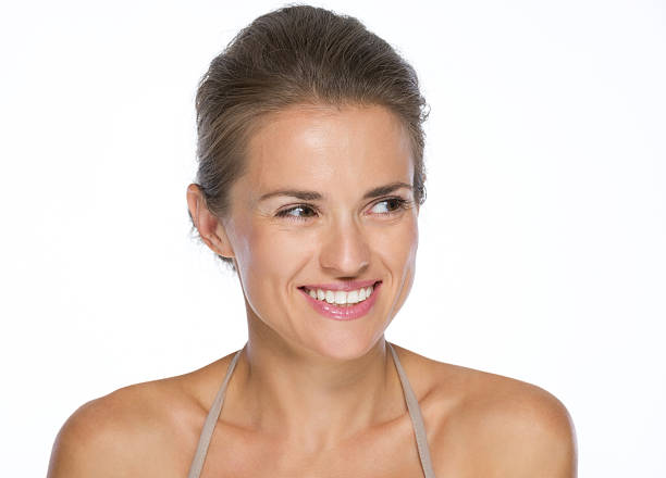 istock happy young woman looking on copy space 478198713