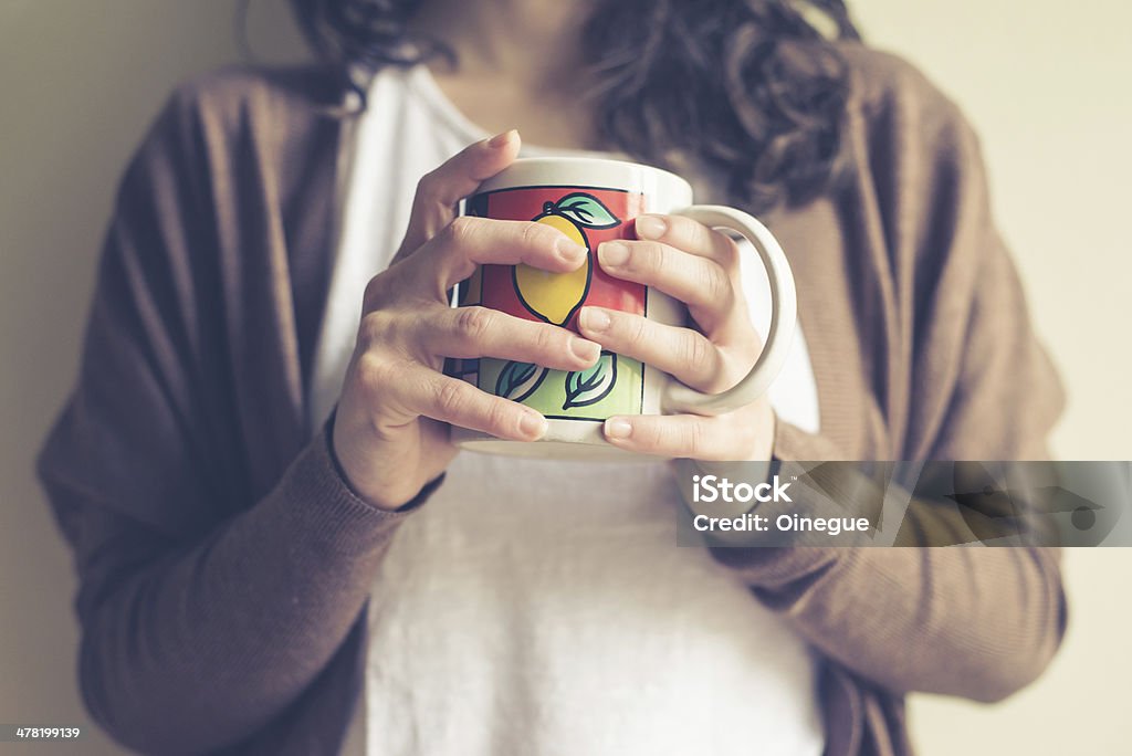close up of hands woman with cup close up of hands woman with cup at home Adult Stock Photo