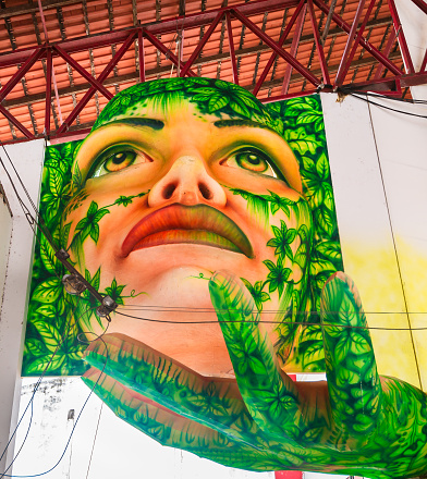 Parintins, Brazil - March 3, 2015. Giant mask depicting human face stored in the warehouse in Parintins awaits annual June Boi Bumba folklore festival.