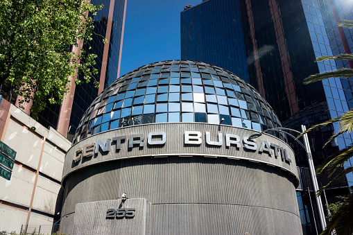 Mexico City, Mexico - March 1, 2015: The Mexican Stock Exchange in downtown Mexico City on a sunny day with flare from the sun.