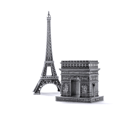 Miniature Eiffel Towers and Arcs de Triomphe as tourist souvenirs
