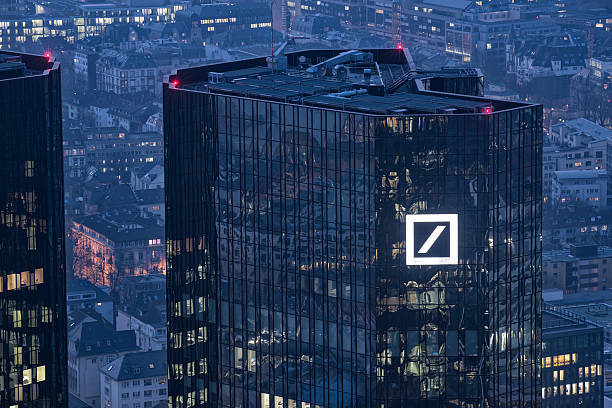 Deutsche Bank Building Frankfurt Germany Frankfurt, Germany-March 6, 2014 : View at the Deutsche Bank Building at dusk.  The Deutsche Bank is a global Bank headquartered in Frankfurt, Germany. hesse germany photos stock pictures, royalty-free photos & images