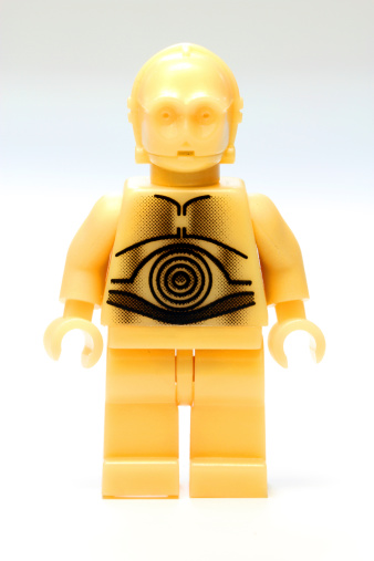 Vancouver, Canada - December 18, 2012: A Lego C3PO from the Star Wars film franchise, posed against a white background.