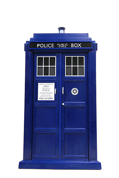 Temporal Monolith Vancouver, Canada - February 17, 2014: A toy TARDIS from Dr. Who, against a white background. The TARDIS is the Doctor's main form of travel, a time machine and spaceship that is larger on the inside. Doctor Who is created by the BBC. bbc photos stock pictures, royalty-free photos & images