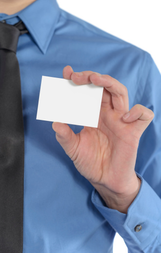 Businessman hand showing someone his business card with follow us 
