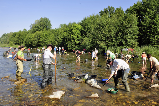 Cardet, France - May 24, 2015: Gold prospectors in full competition for the European Cup in France gold panning in the river Gardon located in the department of Gard.
