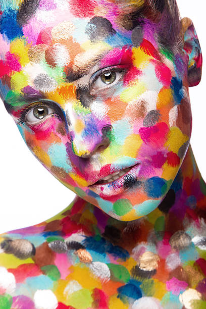 istock Girl with colored face painted. Art beauty image 478203876
