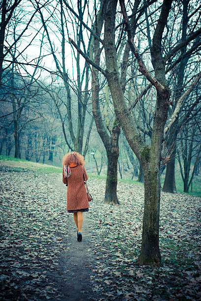 istock young beautiful red curly hair woman 478207485