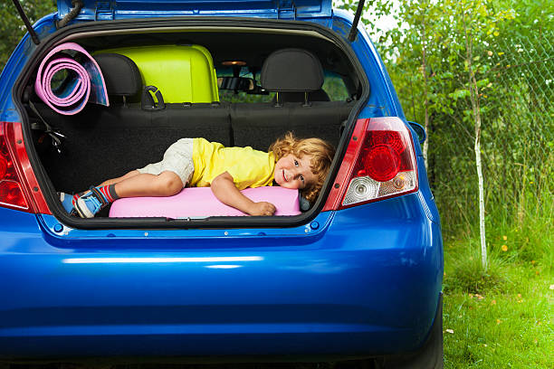 istock Kid laying on the bags waiting for vacation 478207627