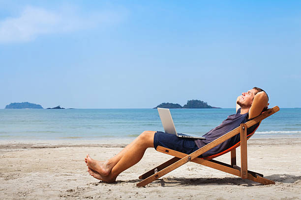 istock businessman on the beach 478208913