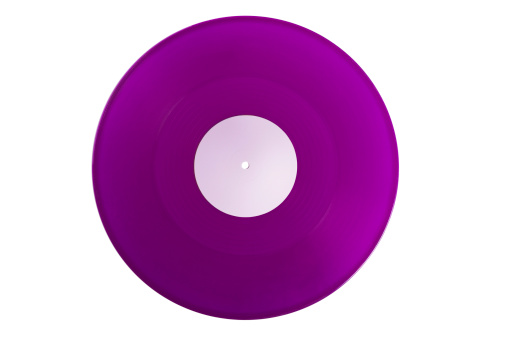 Purple colored vinyl 33rpm LP record with a blank label, isolated on a white background.