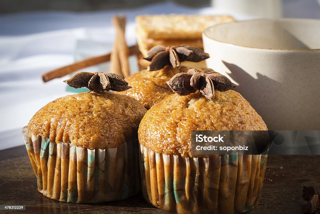 Breadsticks ,Banana cake, milk  and Biscuits with black coffee Breadsticks ,Banana cake , milk  and Biscuits with black coffee in the morning on wooden table Bakery Stock Photo
