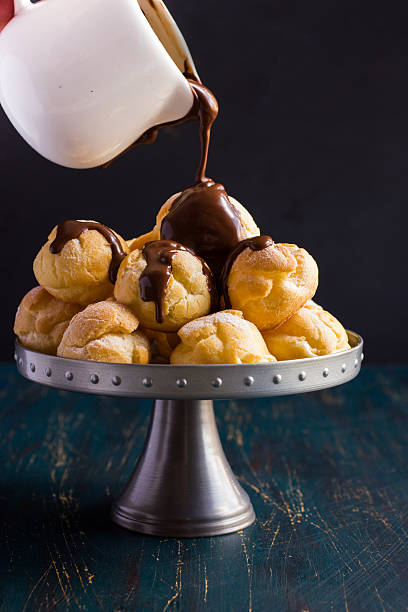 istock profiteroles with cream and chocolate sauce 478212394