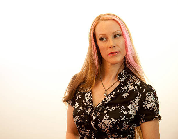 istock Female With Head Tilted to the Left 478214573