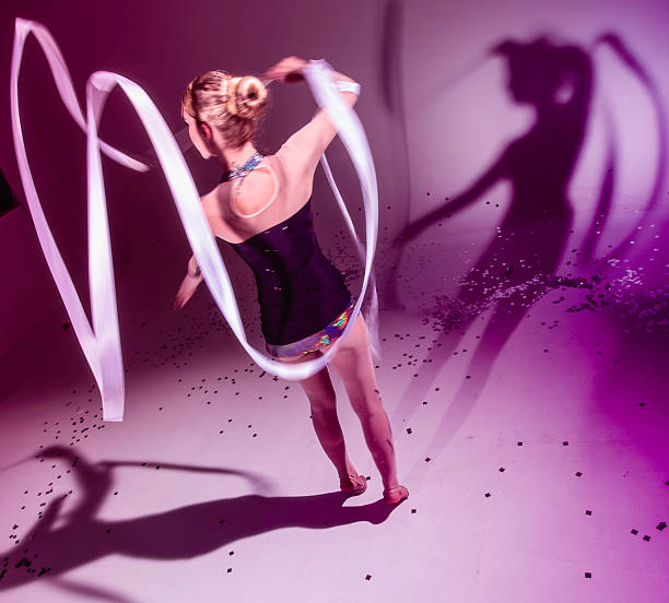 istock Rhythmic Gymnast Twirling a Ribbon 478214581