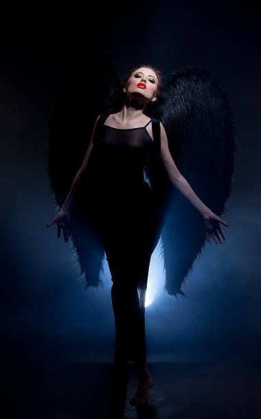 istock Seductive model posing in suit of fallen angel 478215867