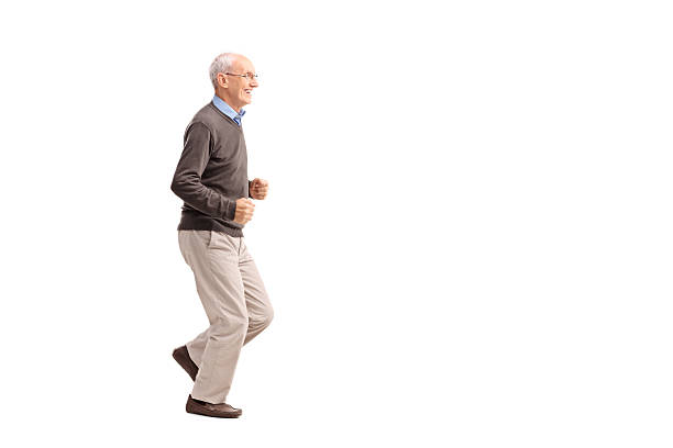 istock Senior man in casual clothes running and smiling 478216448
