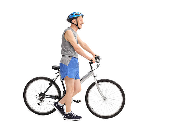 istock Active senior man pushing a bike 478216452