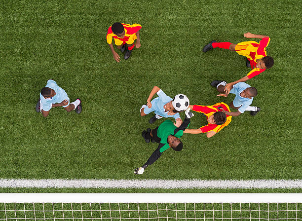 istock Young Boys Playing Football 478224123