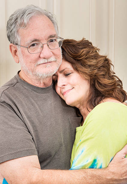 istock Mature couple embracing 478225029