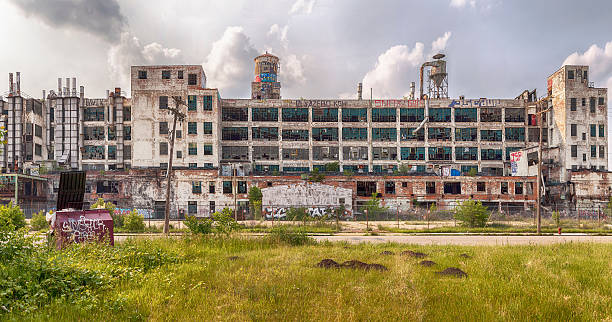 Fisher Body Plant Detroit, USA - June 9, 2015: The Fisher Body Plant is now shut down and covered in graffiti but was used in automotive manufacturing from 1919 until 1984. The building was designed by Albert Kahn and built in 1919. detroit ruins stock pictures, royalty-free photos & images