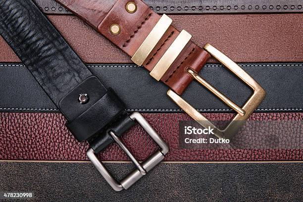 Closeup Of Two Men Belts Stock Photo - Download Image Now - 2015, Abstract, Animal