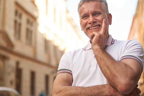 istock Mature man standing on the street 478231044