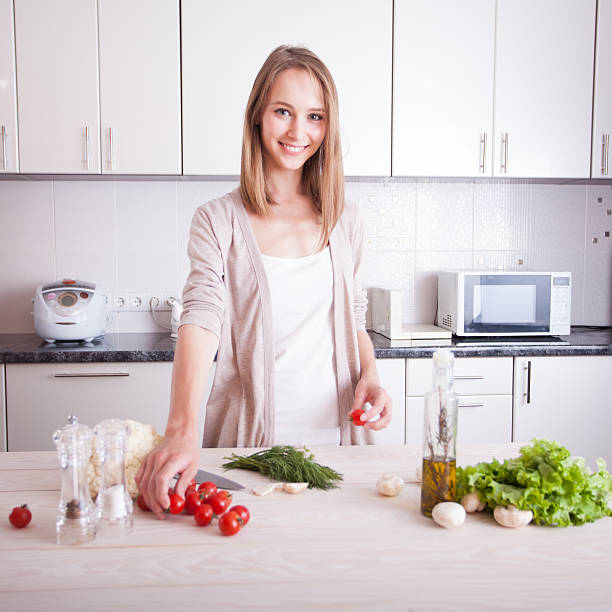 istock woman making healthy food 478231218