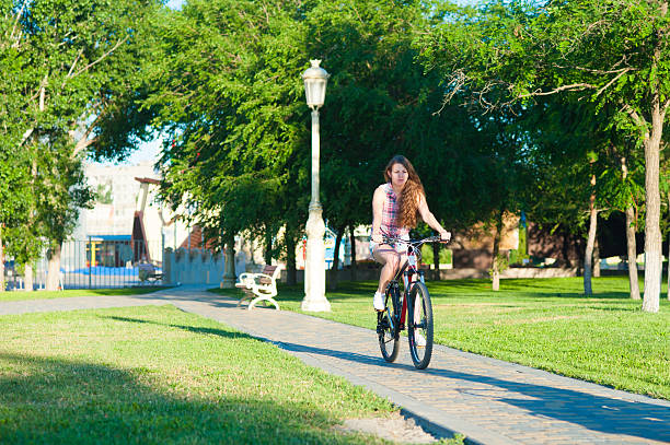 istock Girl riding on bicycle 478234288