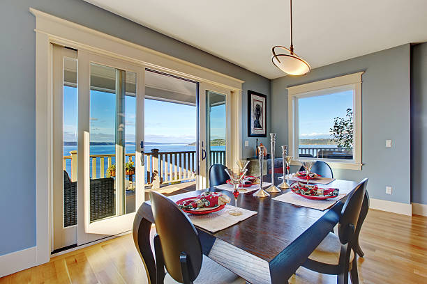 istock Light blue dining area with sliding glass door 478234888