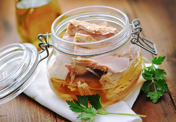 istock Tuna with parsley  in a glass jar 478235476