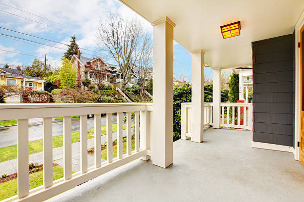 istock Front porch house exterior with spring street 478238719