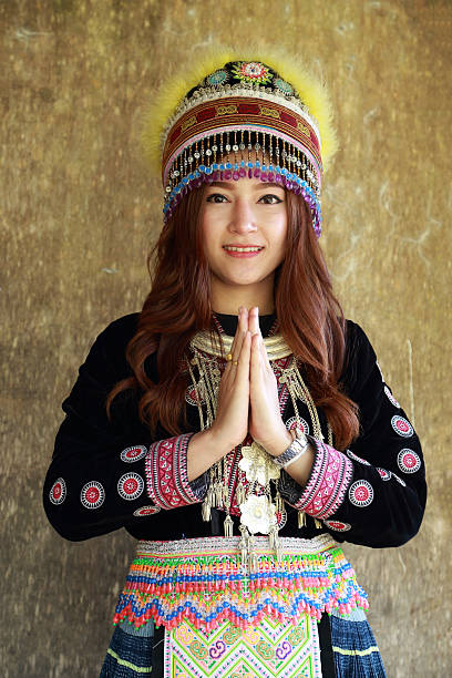 istock Traditionally dressed Mhong hill tribe woman pay respect 478243504