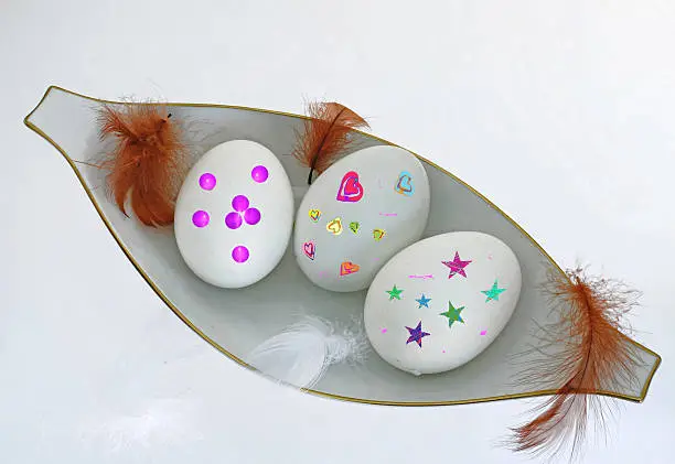 colorful Easter eggs with feathers