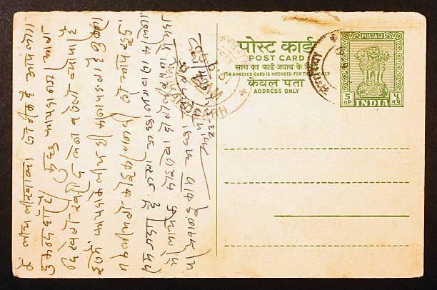 istock Old used indian postcard with words in sanskrit 478245161