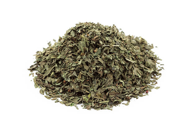 istock Pile of dried basil leaves 478247138