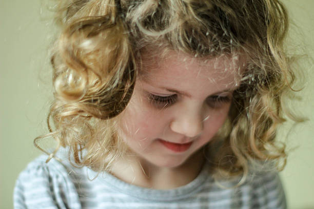 istock Little girl with curly hair 478252809
