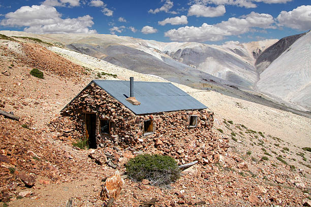 Mountain Stone Cabin An old miner's stone cabin high in the Sweetwater Mountains of Eastern California. This spot is about 10,000' in elevation. miners cabin stock pictures, royalty-free photos & images
