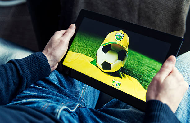 istock Watching Brazil soccer on a digital tablet 478257349