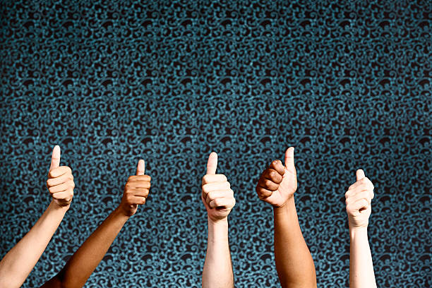 istock Right on! Five mixed hands give thumbs-up sign of approval 478257385