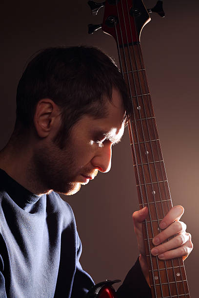 istock Portrait of man with guitar 478257621