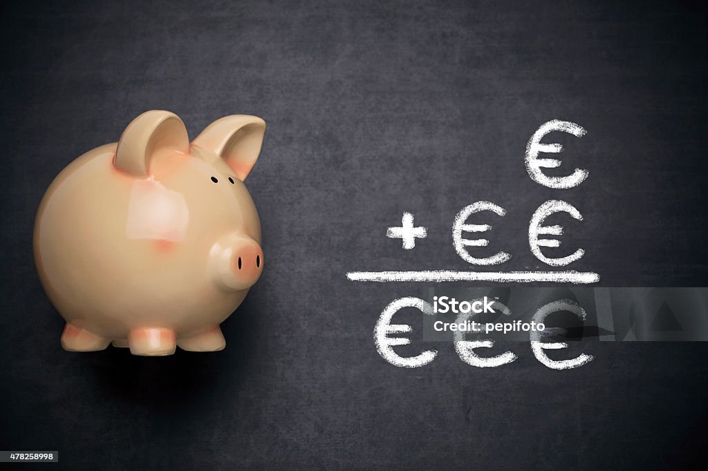 Sparschwein mit Geld sparen Sie - Lizenzfrei 2015 Stock-Foto